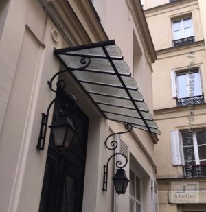 2014 11 MARQUISE ACIER SUR PORTE IMMEUBLE HAUSMANNIEN PARIS 8 - RESULTAT